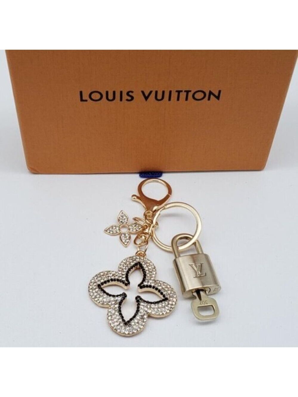 Authentic Louis Vuitton Gold Lock & Box w/ Unbranded Clover Bagcharm 121825